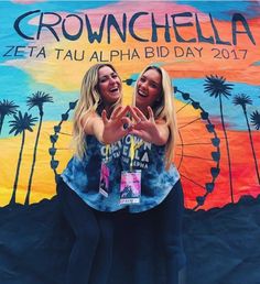 two beautiful women standing in front of a colorful wall with palm trees and the words crowncella written on it