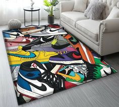 a living room area rug with colorful shoes on it