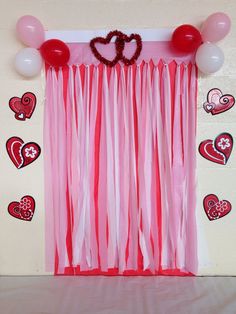 pink and red valentine's day backdrop with heart balloons on the window sill