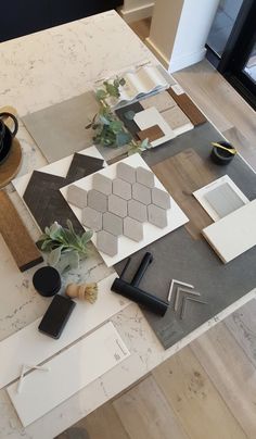 the table is covered with different types of tiles