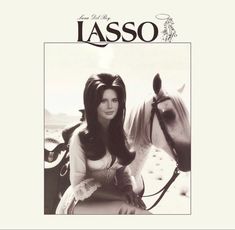 a black and white photo of a woman sitting next to a horse on the cover of lasso magazine