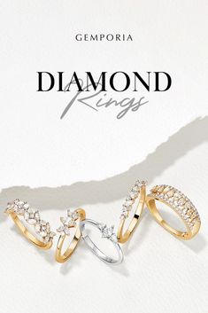 three gold and silver rings with diamonds in them on top of a piece of paper