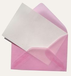 a pink envelope with a white piece of paper sticking out of it's side