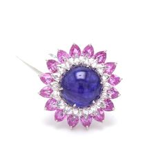 Designer Colorstone Jewelry by Jewelove Gemstone : Tanzanite, Pink Sapphire & Rose Cut Diamonds Carat Weight of Tanzanite : 15.63 cts. Carat Weight of Pink Sapphire : 5.83 cts. Carat Weight of Rose Cut Diamonds : 1.45 Cts. Metal : 18K White Gold Gold Purity : 18K Purity Mark : 18K Gross Weight : 10.16 grams Certificate of Authenticity : SGL / Veega Gem Lab P.S. : This ring has been sold. Please call us at +91-9828012999 or email at WeCare@Jewelove.in to inqure about similar emeralds. Pink Round Gemstones With Prong Setting, Round Multi-stone Sapphire Ring, Round Multi-stone Tanzanite Gemstones, Hallmarked Pink Sapphire Round Rings, Round Pink Sapphire Gemstone Jewelry, Multi-stone Tanzanite Round Ring, Round Tanzanite Gemstones With Accent Stones, Pink Sapphire Round Gemstones For Gifts, Round Pink Sapphire Gemstones For Gift