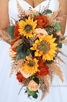 a bridal bouquet with sunflowers and other flowers is shown in this image