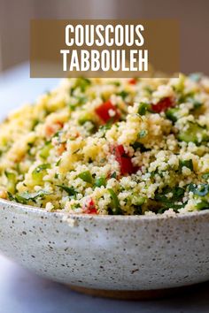 a bowl filled with couscous tabbouleh on top of a table