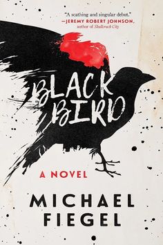 a black bird sitting on top of a book cover