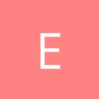 the letter e is shown in white on a pink background with an orange and black border