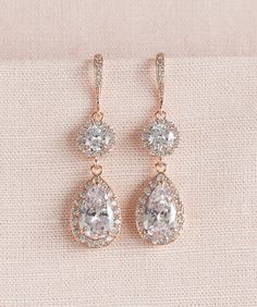 "I've created the Evelyn Earrings with crystals and soft tone rose gold settings for a beautiful and classic look. I use all high quality chain/materials and all my jewelry is nickel free. LARGE SET Total length of earrings: 2\" Earrings are 5/8\" at their widest point. Length of Dangle portion of earring: 1 1/2\" Necklace focal measures 1 5/8\" long SMALL SET Total length of earrings: 1 3/4\" Earrings are 1/2\" at their widest point. Length of Dangle portion of earring: 1 1/4\" Necklace focal m Wedding Jewelry Crystal, Rose Gold Bridal Earrings, Crystal Wedding Jewelry, Crystal Bridal Earrings, Bracelet Rose Gold, Gold Bridal Earrings, Rose Gold Bridal, Rose Gold Hair, Jewelry Crystal