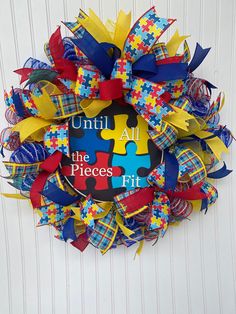 a colorful wreath that says until all the pieces fit