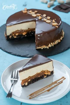 a piece of chocolate cheesecake on a plate with a fork