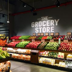 a grocery store filled with lots of fruits and vegetables