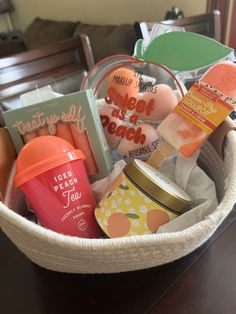 a basket filled with lots of items on top of a table