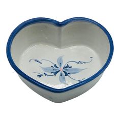 a blue and white heart shaped bowl