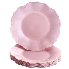 pink plates stacked on top of each other