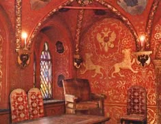 an ornately decorated room with chairs and tables