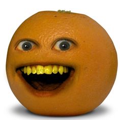 an orange with a mouth and teeth on it's side, sitting on a table