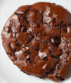 a chocolate cookie on a white plate