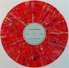 an orange and red disc with white writing on the front cover that says dale and production