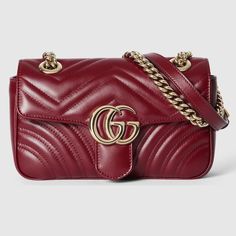 "Find GUCCI Gg Marmont Mini Shoulder Bag Leather on Editorialist. Presenting the House's red hue Gucci Rosso Ancora on the GG Marmont, this mini shoulder bag presents the iconic style in a signature color for Pre-Fall, complete with light gold toned hardware and ivory leather lining. Gucci Rosso Ancora matelassé chevron leather, Light gold toned hardware, Ivory leather lining, Double G, Sliding chain strap can be worn as a shoulder strap with 55cm drop or can be worn as a top handle with 30cm dr Gucci Quilted Formal Shoulder Bag, Luxury Quilted Gucci Bag, Formal Quilted Gucci Bag, Marmont Gucci Bag, Gucci Bag Marmont, Gg Marmont Matelassé Mini Bag, Gucci Super Mini, Ysl Lip, Gucci Gg Marmont Mini