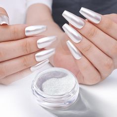 White Pearl Chrome Nail Powder Super Glossy Shine Pearlescent Nail Glitter Nail Art ❤ Package Include—1* 1g White Moonlight Chrome Nail powder, 1* Instruction, 4* Double Sponge Sticks ❤ Moonlight Chrome Nail Powder: It has a strong highlight and a mirror-like finish. The gorgeous and dreamy scenes, give you a beautiful reverie.under the moonlight has a touch of mystery, filling people with curiosity and a desire to explore. ❤ Super Glossy Shine—The white chrome nail powder with its effect is nothing short of magical. It transforms nails into a shimmering mirror of beauty that captures the essence of elegance and sophistication. ❤ A little goes a long way—So this will last for a long time. It lasts for weeks without chipping or losing its luster, maintaining a salon-quality look with minima White Gold Glitter Nails, Pearl White Chrome Nails, Pearl Chrome, White Chrome Nails, Gel Polish Nail Designs, Pearl Nail, Chrome Nail Powder, Chrome Nails Designs, Under The Moonlight