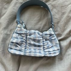 This Is A Blue And White Bag That I Have Never Worn, It Is New Blue Bags For Summer Errands, Trendy Blue Shoulder Bag For Day Out, Trendy Blue Bags For Day Out, Blue Casual Baguette Satchel Bag, Casual Blue Satchel Baguette Bag, Casual Blue Baguette Satchel Bag, Casual Blue Baguette Bag Satchel, Trendy Blue Baguette Bag For Everyday, Casual Blue Baguette Bag For Daily Use