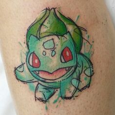 a pokemon tattoo on the leg of a woman