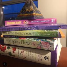 a stack of books sitting on top of each other