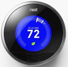 an nest thermostat is shown on a white surface with blue and black trim