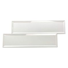 two white rectangular trays sitting next to each other