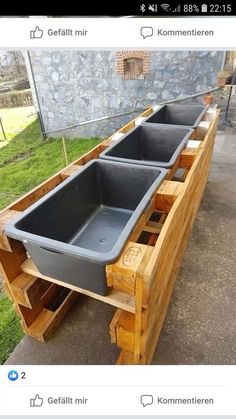 an old wooden cart with two sinks on it