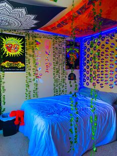 a bedroom decorated with neon lights and decorations