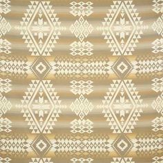 a beige and white rug with an abstract design