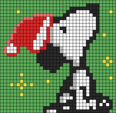 a cross stitch pattern with a black and white dog holding an umbrella in it's mouth