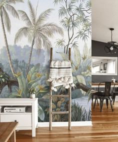 the wallpaper in this dining room is painted with tropical scenes