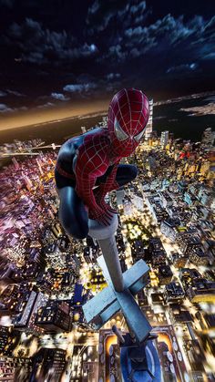 a spider man flying through the air over a city at night with buildings in the background