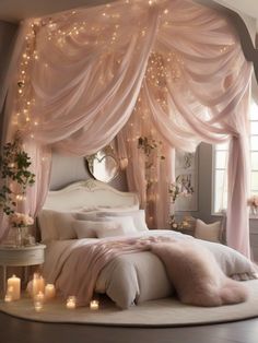 a white bed with pink curtains and lights on the headboard is surrounded by candles