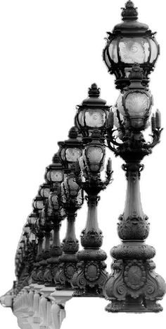 many lamps are lined up in the shape of a long line on top of each other