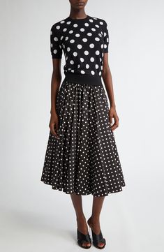 Bold polka dots add a playful spin to this jacquard-knit wool-and-silk sweater from D&G's Mambo collection inspired by styles of the '40s and '50s. Crewneck Short sleeves Ribbed cuffs and hem 57% virgin wool, 43% silk Dry clean Made in Italy Designer Clothing Pokadot Skirt, Polka Dot Skirt Outfit, Dot Skirt Outfit, Silk Sweater, Polka Dot Skirt, Dot Skirt, Jacquard Knit, Mambo, Circle Skirt