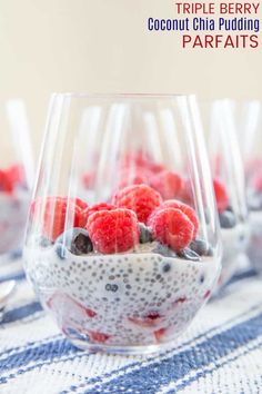 berries and blueberries are in a bowl on a table