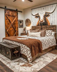 a bedroom with a cow head painted on the wall above the bed and wooden furniture