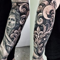 a man's arm covered in black and grey ink with an image of the statue of liberty