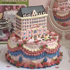 there is a cake made to look like a house