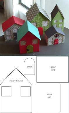 three paper houses are shown next to each other