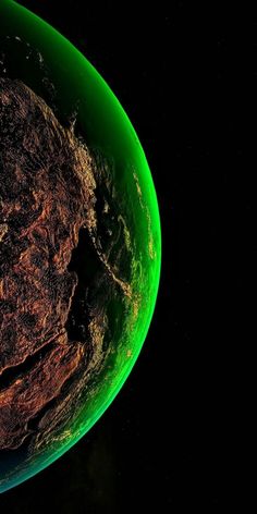 an image of the earth from space in green and brown colors, with dark background