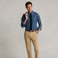 Dyed for a deep saturated color these flat-front trousers are crafted with stretch cotton chino that is specially treated for an ultrasoft texture. Brown Pants Blue Shirt Men, Chino Pants Outfit Men, Light Blue Trousers, Dark Blue Shirt, White Shoes Men, Pants Outfit Men, Brown Dress Pants, Chino Pants Men, Khaki Pants Men