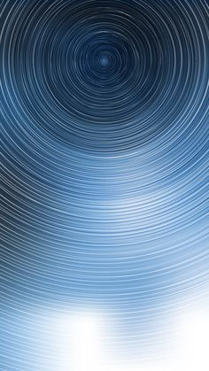 an abstract blue background with circles in the middle