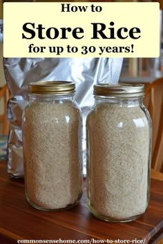 two jars filled with rice sitting on top of a wooden table next to a bag