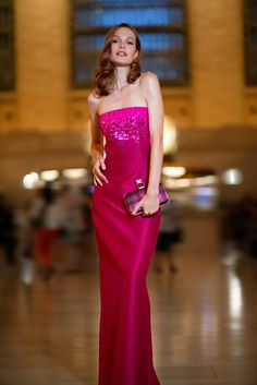 It takes more than one glance to understand the beauty of Phaedra. Made in our signature stretch Mikado, she's a figure-hugging strapless column gown with a ribbon to accentuate the waist. Upon closer look, you'll notice hand-beaded embellishments throughout the bodice, creating a geometric masterpiece of pink sequins. This column gown is featured in vertical stretch Mikado, a fabric that is known to hold its shape. The vertical stretch gives the fabric its bounce and maintains the design's silh Luxury Strapless Evening Dress For Prom Season, Luxury Strapless Evening Dress For Prom, Luxury Strapless Prom Dress, Luxury Strapless Gown For Gala, Luxury Strapless Maxi Dress For Formal Occasions, Luxury Strapless Dress, Luxury Strapless Evening Dress, Luxury Strapless Mini Dress For Formal Occasions, Luxury Fitted Strapless Mini Dress