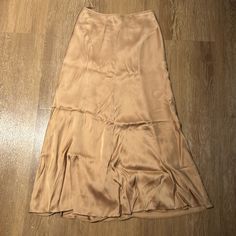 100% Silk. Brand New Never Worn Elegant Brown Asymmetrical Skirt, Elegant Brown Maxi Skirt For Party, Elegant Brown Skirt For Evening, Elegant Brown Evening Skirt, Elegant Evening Brown Skirt, Elegant Brown Maxi Skirt, Elegant Brown Flowy Maxi Skirt, Elegant Flowy Brown Maxi Skirt, Beige Silk Skirt For Formal Occasions